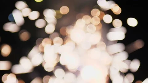 The light is out of focus. Many abstract circles shimmer with bright colors and Stock Footage 227025345