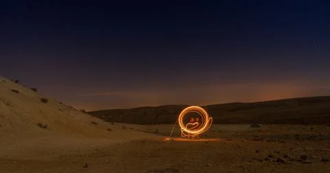 Light paining in night desert Stock Photos