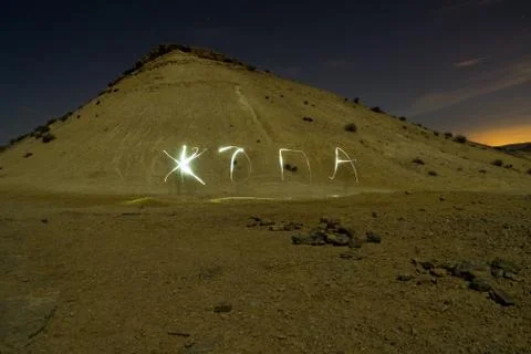 Light paining in night desert Stock Photos