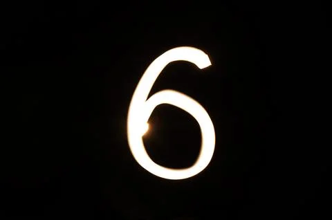 Light Painted Number 6. Symbol of Family, Care, and Harmony Stock Illustration