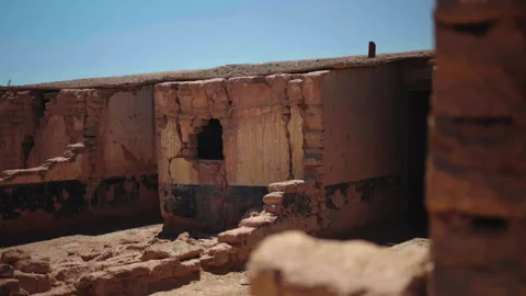 Light pan across ruined wall of Chacabuco camp Vidéo 337874712