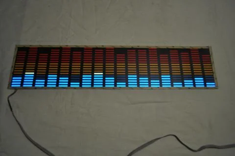 Light panel of pixels, neon with blue or green, yellow and red, bright equalizer Stock Photos