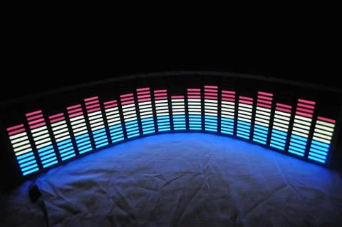 Light panel of pixels, neon with blue or green, yellow and red, bright equalizer Stock Photos