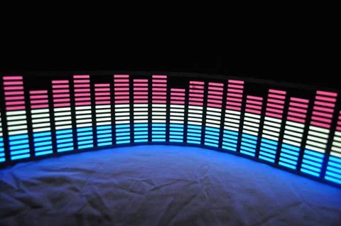 Light panel of pixels, neon with blue or green, yellow and red, bright equalizer Stock Photos