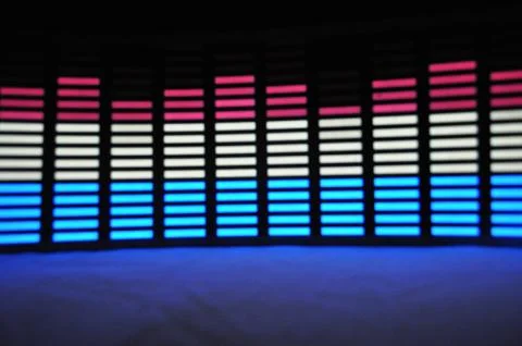 Light panel of pixels, neon with blue or green, yellow and red, bright equalizer Stock Photos