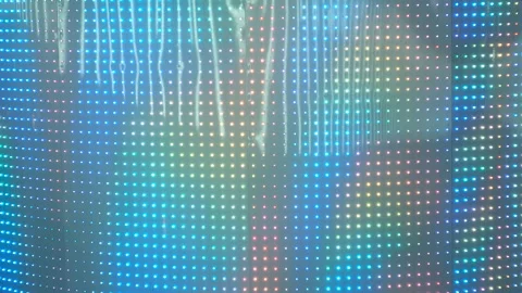 Light panel showing abstract colorful animation reflecting from city lights. Stock Footage 309198142