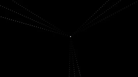 Light particles move in a dark space creating a tunnel Stock Footage 339325721