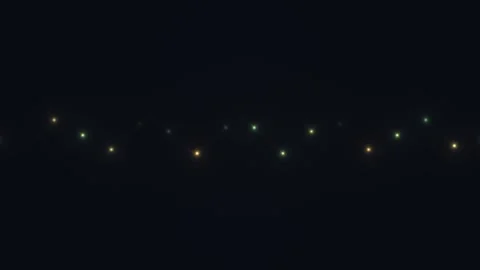 Light particles move in wave patterns against a dark Stock Footage 338295644