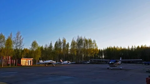 Light passenger planes parked at a private airport Video stock 90083891