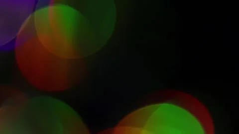 Light passes through a brilliant seven-color bokeh on the left. Vidéo 309970024