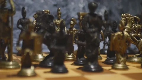 Light passes through the chess pieces creating a futuristic shadow Stock Footage 232640055