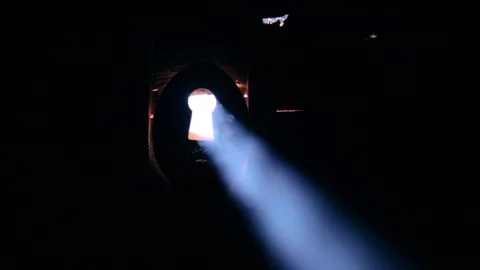 Light passing through a keyhole 库存影片 258838810