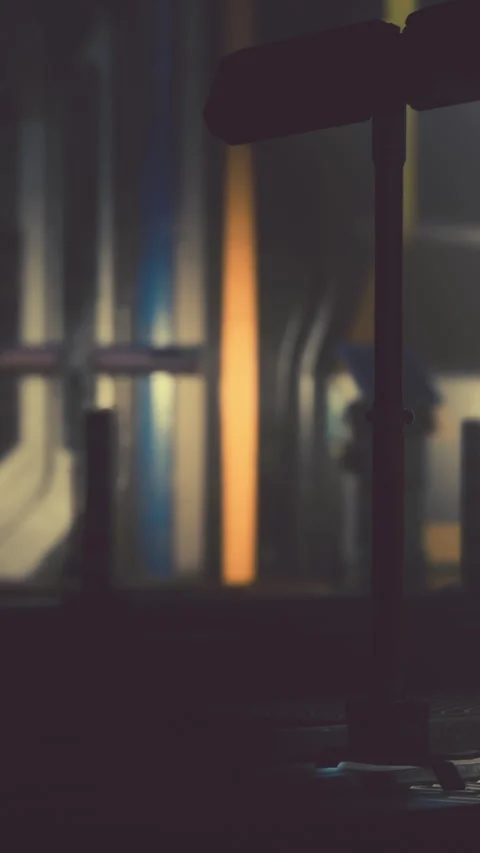 Light patterns and shadows create a night scene in an urban setting Stock Footage 335189525