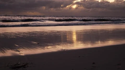 Light patterns on a beach after sunset 6K Stock Footage 313798085