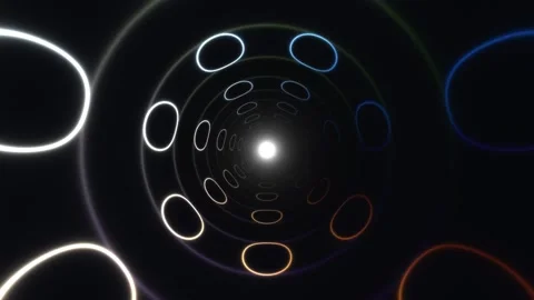 Light patterns create a circular tunnel effect in dark Stock Footage 338014457