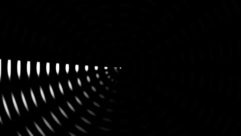 Light patterns create dynamic shapes in a dark tunnel view Stock Footage 339322765
