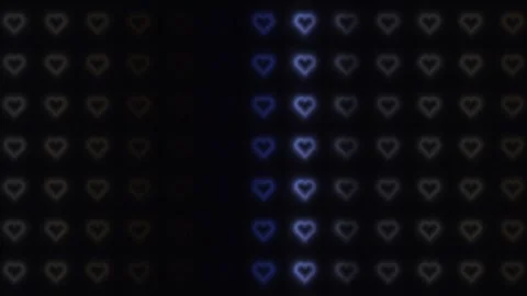 Light patterns create heart shapes in a dark background Stock Footage 338065181