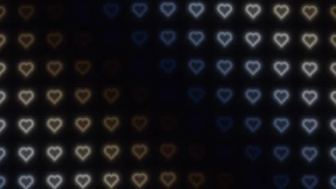 Light patterns create heart shapes on a dark background Stock Footage 338288103