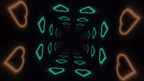 Light patterns create heart shapes in a dark tunnel at Stock Footage 338299085