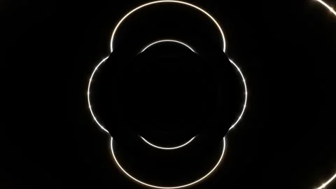 Light patterns create shapes in dark space during visual Stock Footage 339329412