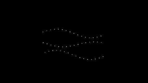 Light patterns create wave effects on a dark background Stock Footage 339513406