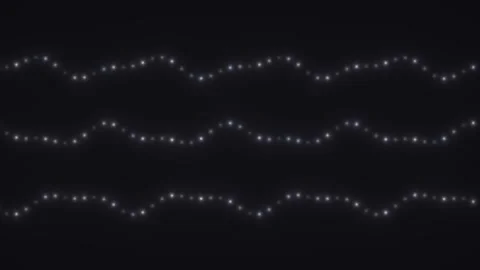 Light patterns create waves of bright points in a dark Stock Footage 338231800