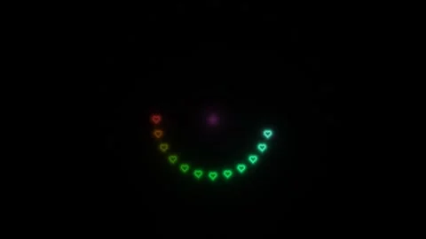 Light patterns creating a heart shape in dark space with Stock Footage 339301716