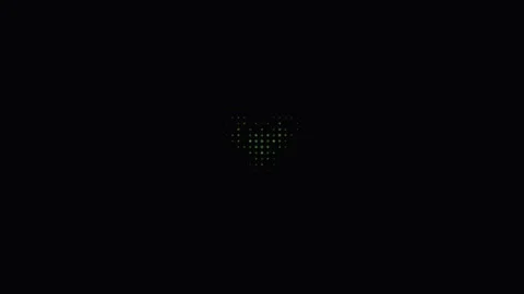 Light patterns form a heart shape on a dark background Stock Footage 338228521