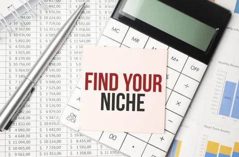 On a light pink background, light blue pencils, paper clips and a white noteb Stock Photos