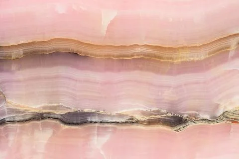 Light pink blurred background made of pink jade or Nephrite Stock Photos