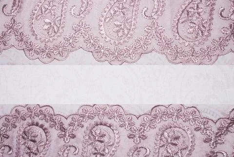 Light pink fabric texture with patterns.Background pink with lace. Foto stock