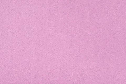 Light pink felt background - close-up of the soft surface of the fabric. Stock Photos