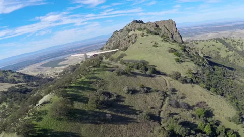 Light plane flying through mountain range Stock Footage 240161455