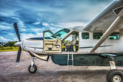 Light plane parked on tarmac Stock Photos