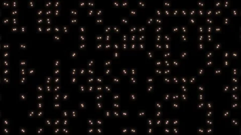Light points create a pattern on a dark background in a Stock Footage 339025220