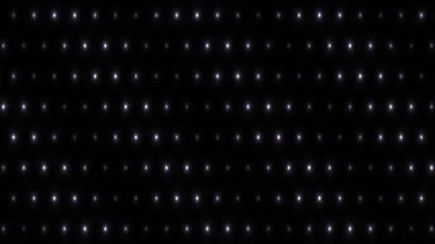 Light points create patterns on a dark background in motion Stock Footage 338034559