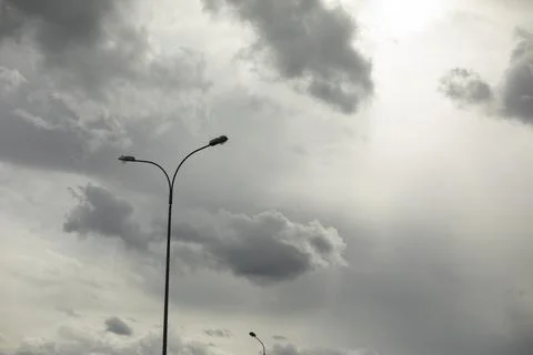 Light pole against sky. Celestial landscape in cloudy weather. Foto stock