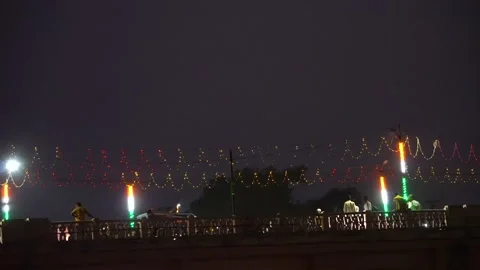 Light pole and twinkling lights on the bridge at night Stock Footage 217399526