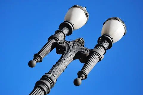 Light pole in a blue sky Stock Photos