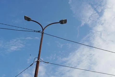 Light pole on a cloudy sky background Stock-Fotos