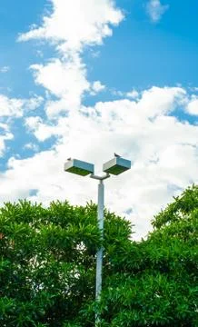 Light pole at park in nice blue sky Stock Photos
