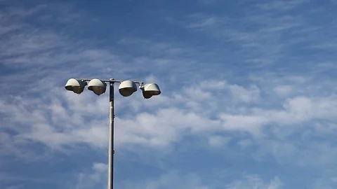 Light pole with sky background. Stockbeeldmateriaal 81635899