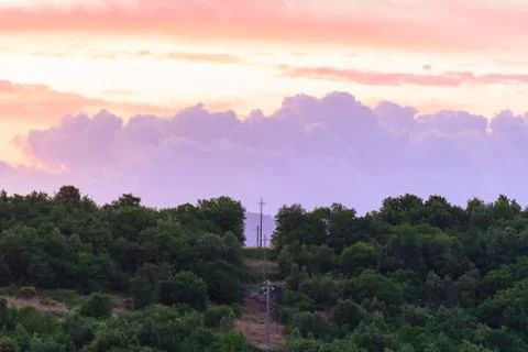 Light poles at sunset Stock Photos