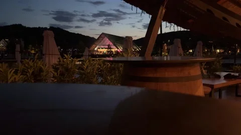 Light pollution increasing in resort town at dusk Stock Footage 314401901