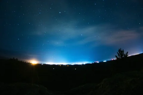 Light pollution over town at night Stock Footage 128158467