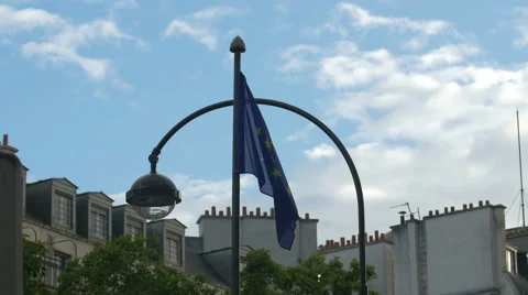 A light post and a waving flag of European Union, in Paris Stock Footage 59974474