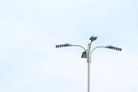 Light Post With Blue Sky Background and multi light Stock Photos