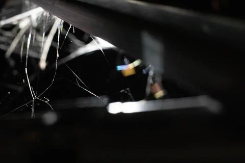 Light post of a bridge with spider webs at night with shallow depth of field Stock Photos
