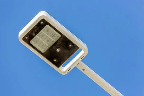 Light post isolated with blue sky background Stock Photos