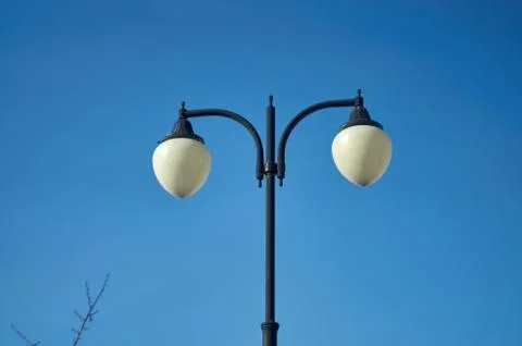Light post with two lamps Stock Photos
